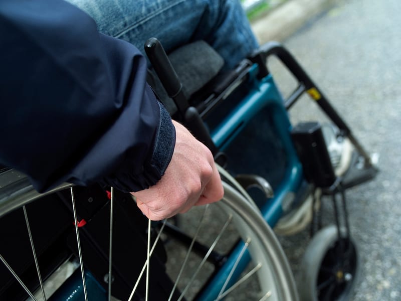 Man in wheelchair. A slip and fall accident can happen anywhere at any time.
