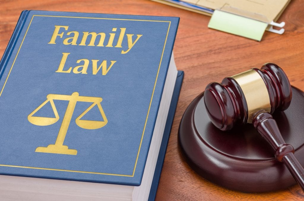 Family law book and gavel. Mediation is a private and cost-effective way to handle family disputes outside of court while keeping conversations productive, respectful and conclusive.