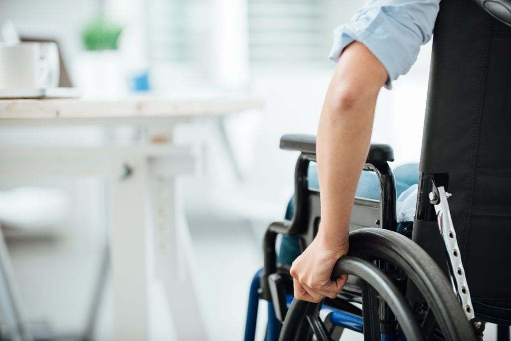Woman in a wheelchair. Individuals with catastrophic injuries require permanent, long-term care and their lives often change dramatically.